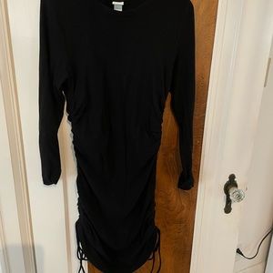 H&M long sleeve black dress with side rushing and ties. Size medium